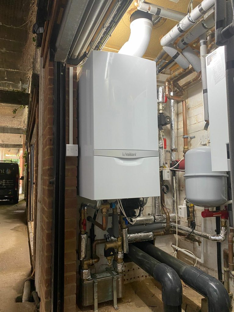 Close-up of a boiler inspection, ensuring safety and optimal performance in Shepherd's bush